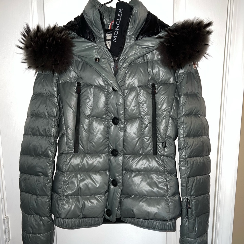 Moncler Grenoble Women’s Puffer Coat W/ Attachable Asiatic Raccoon Hoodie.